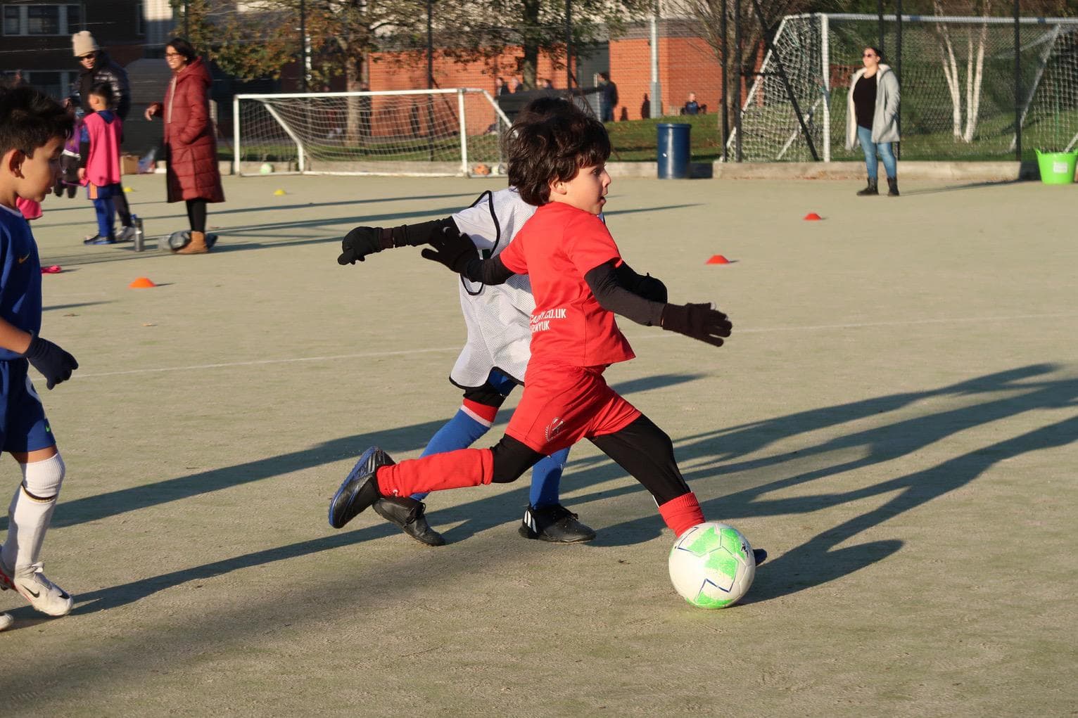 Boys playing indoor soccer